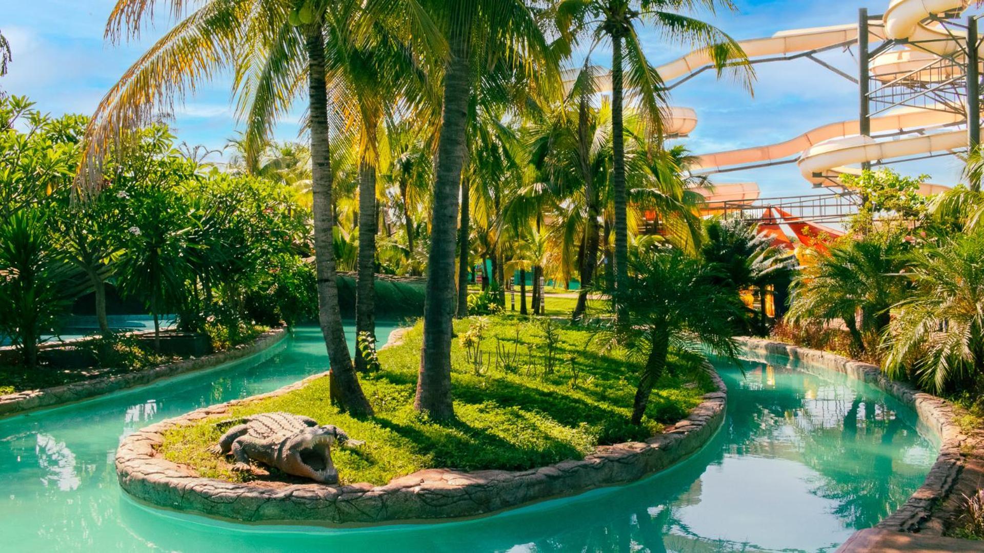 Hot Beach Resort Olimpia Exterior photo The artificial river